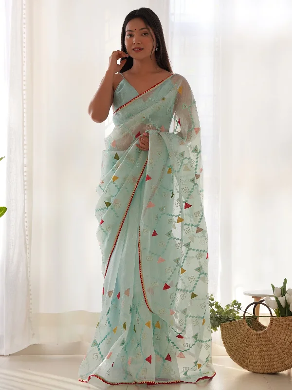 Women's Organza Light Blue Embellished Designer Saree With Blouse Piece Airy Cotton Blouse Women's Organza Light Blue Embellished Designer Saree With Blouse Piece Airy Cotton Blouse